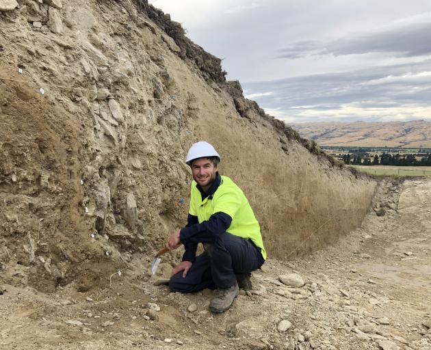 University of Otago geology PhD student Jonathan Griffin works on the Hyde Fault, at the foot of...