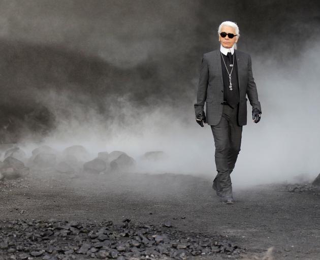 German designer Lagerfeld appears at the end of his Fall-Winter 2011/2012 show for Chanel during Paris Fashion Week. Photo: Reuters