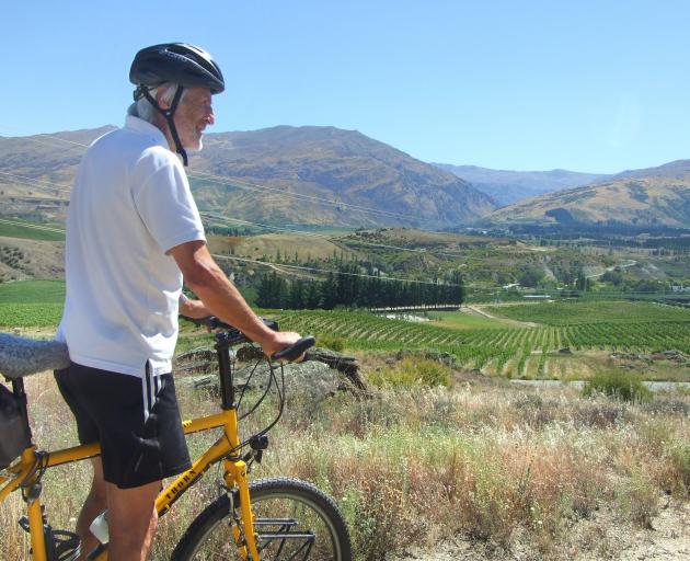 Push Bike Trail boss Tim Hawkins, of Bannockburn, takes in the Central Otago landscape before the...