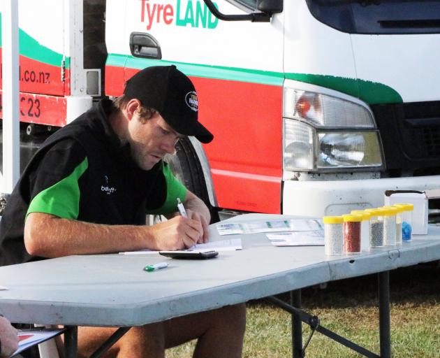 Alan Harvey concentrates on one of the challenges he completed on the way to becoming the Aorangi FMG Young Farmer of the Year. Photo: Supplied