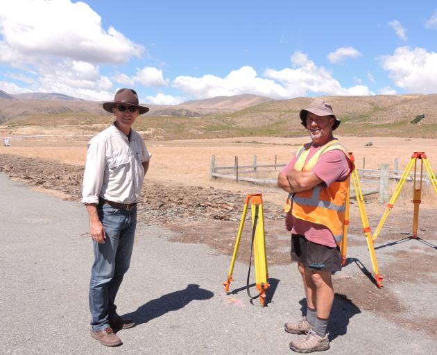 University of Otago Sciences pro-vice-chancellor Richard Barker scopes out one of the surveying field sites on Otematata Station with professional practice fellow Jim Bazsika. Photo: Sally Brooker