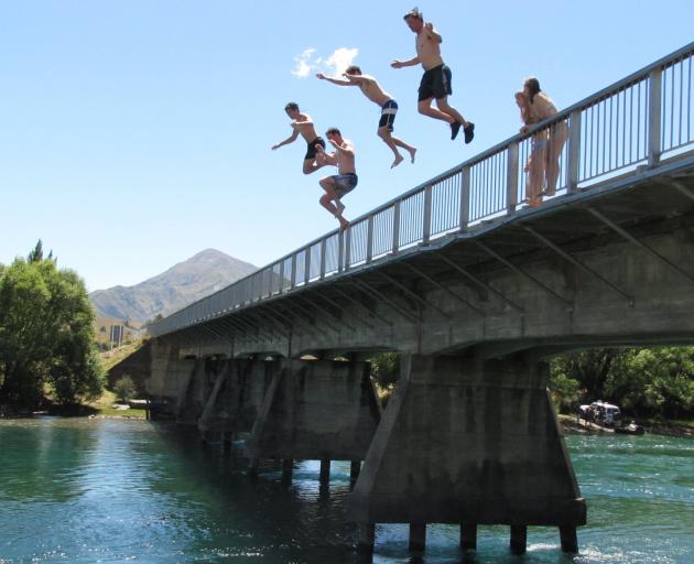 Young people have been jumping off the Albert Town bridge for years. Photo: ODT files