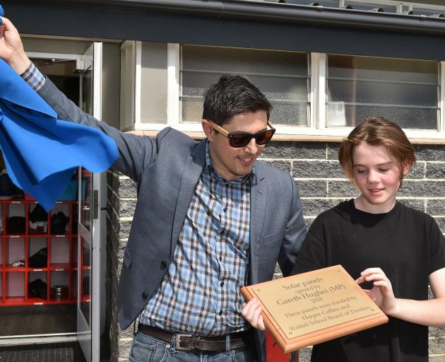 Green MP Gareth Highes and Waitati School student Quince Field at the opening of the Waitati...