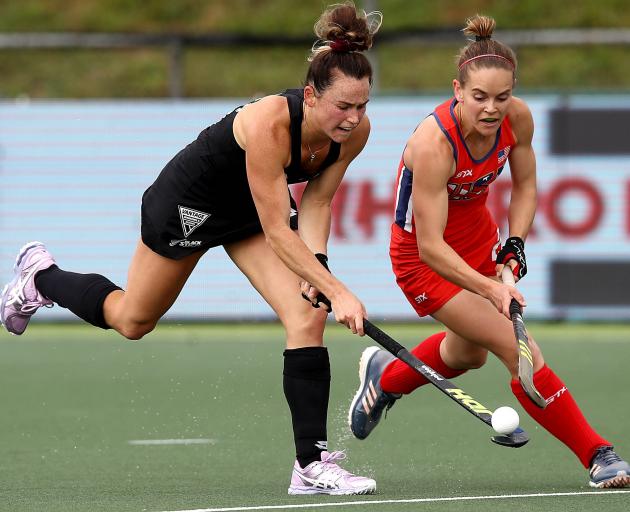 New Zealand’s Kelsey Smith (left) plays the ball under pressure from Alyssa Manley of the United...