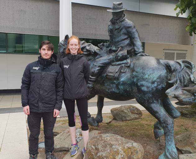 Hunter Burke and Ella Cox at Dunedin Airport upon their arrival home after spending the summer luging in Europe. Photo: Supplied