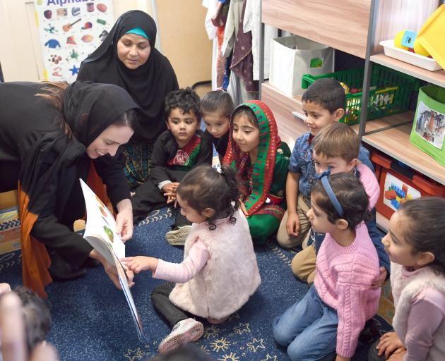 Jacinda Adern reads  The Very Hungry Caterpillar to children at the Au-Nur Child Education and Care Centre in South Dunedin. Photo: Stephen Jaquiery