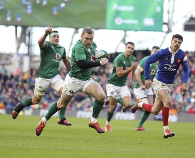 Ireland's Keith Earls breaks through to score a try against France during their Six Nations rugby union international match between Ireland and France at the Aviva Stadium in  Dublin, Ireland. Photo: AP