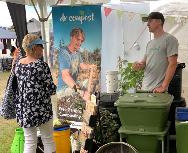 Have you read ALL the instructions?  Ben Elms gives composting advice to Ann Fowler at the Wanaka A&P Show. Photo: Tessa Payze