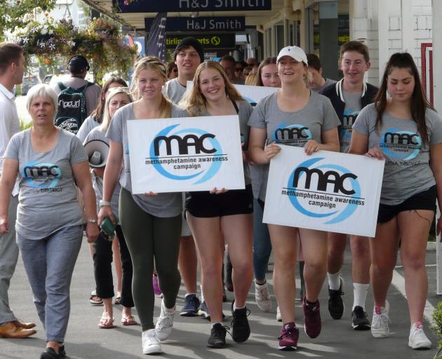 Members of the Clutha District Youth Council head a public march for methamphetamine awareness in...