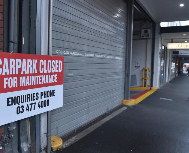 A sign on the closed door of the Wall Street Mall car park in St Andrew St conveys the bad news...