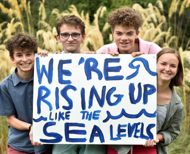 Logan Park High School pupils (from left) Zak Rudin (16), Finn McKinlay (17), Abe Baillie (16) and Linea Simons (16) prepare to strike for action on climate change. Photo: Peter McIntosh