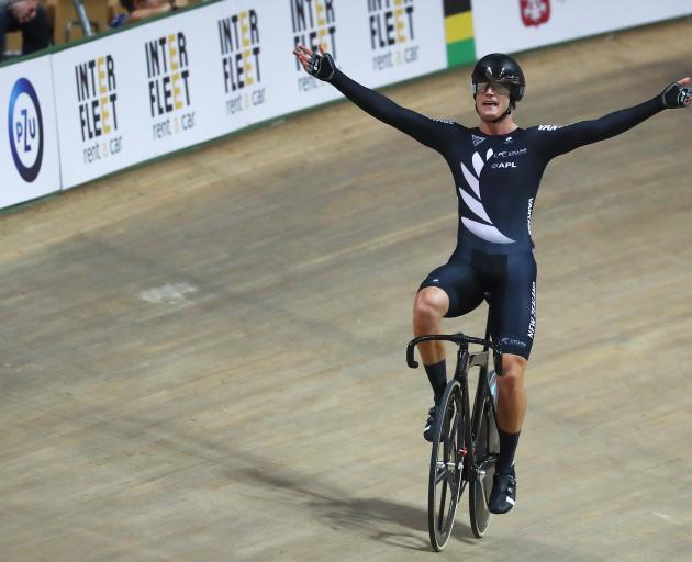 Campbell Stewart celebrates winning the world title in the omnium. Photo: Getty Images