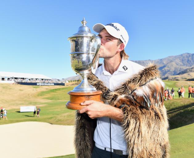 Zach Murray, of Australia, kisses the Brodie Breeze Challenge Cup after winning the New Zealand...