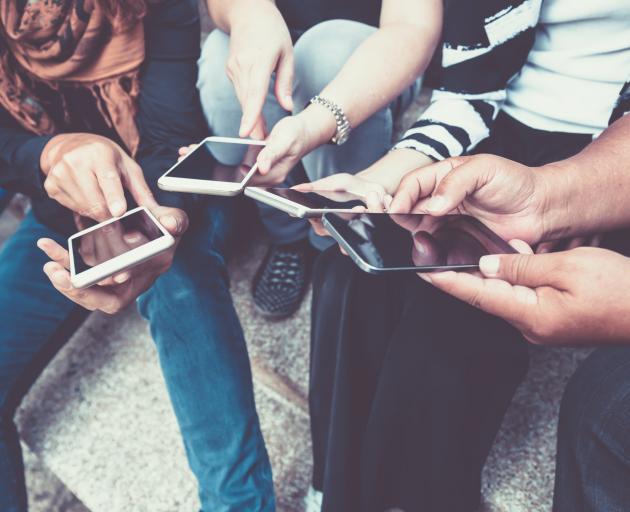 Caution surrounds sharing messages both in and out of work time. PHOTO: GETTY IMAGES

