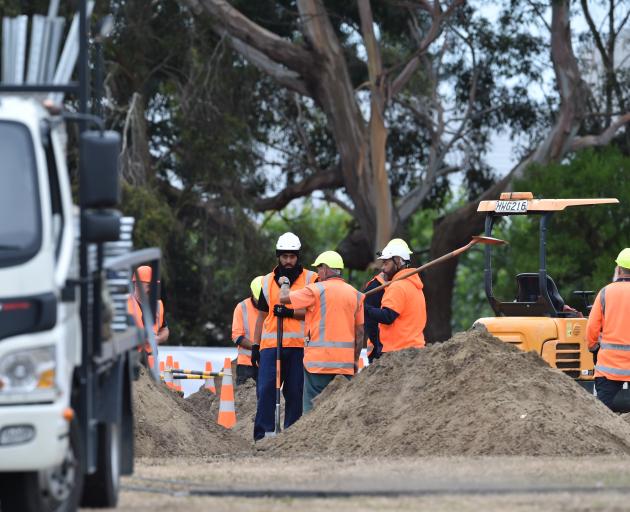 Heavy machinery is being used for the preparation of graves. Photo: Gregor Richardson