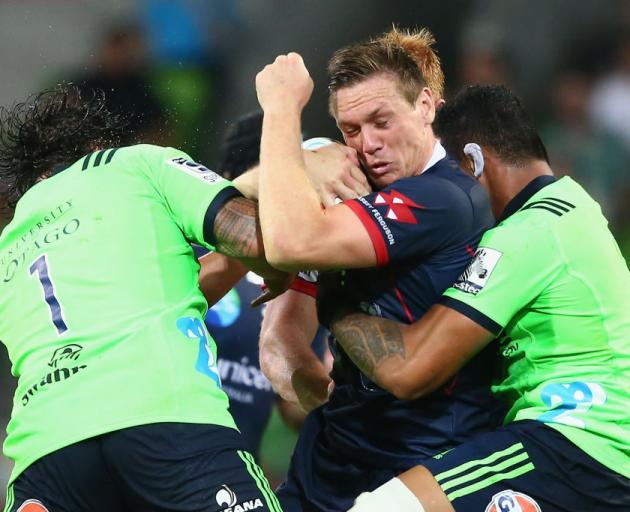 Dane Haylett-Petty of the Rebels is tackled during the round three Super Rugby match between the Rebels and the Highlanders. Photo: Getty Images