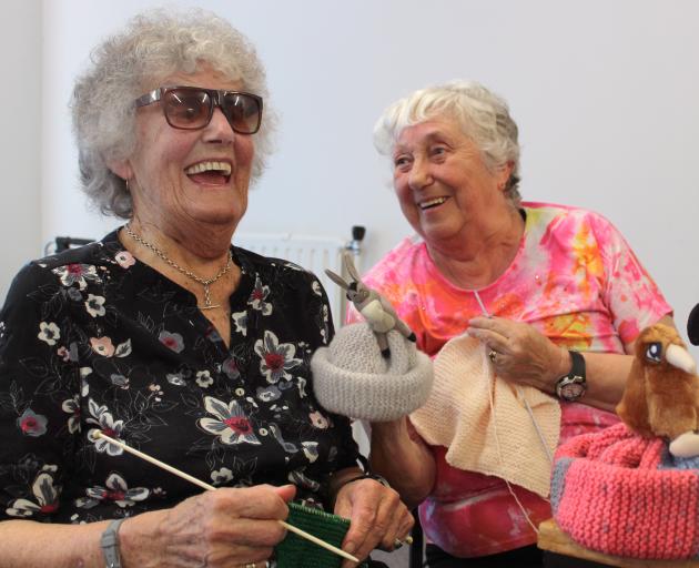 Isabelle Goodare and Helen White are among the Blind Foundation's knitters and will sell their beanies at Orphans Aid Opshop in Invercargill. Photos: Luisa Girao