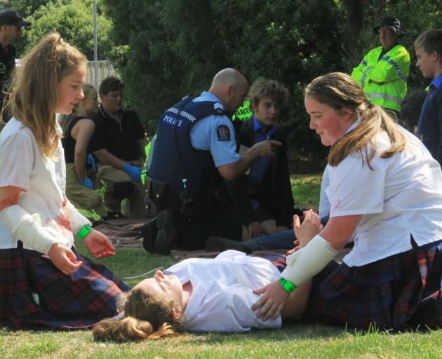 St Kevin's College pupils Elizabeth Plieger (15, left), Nadine Jellyman (13), and Emily Hayman ...