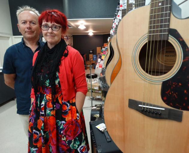Mainstreet Musicworks owners Mark Renalson and Deirdre McNulty will close the lower Thames St business next month. Photo: Daniel Birchfield
