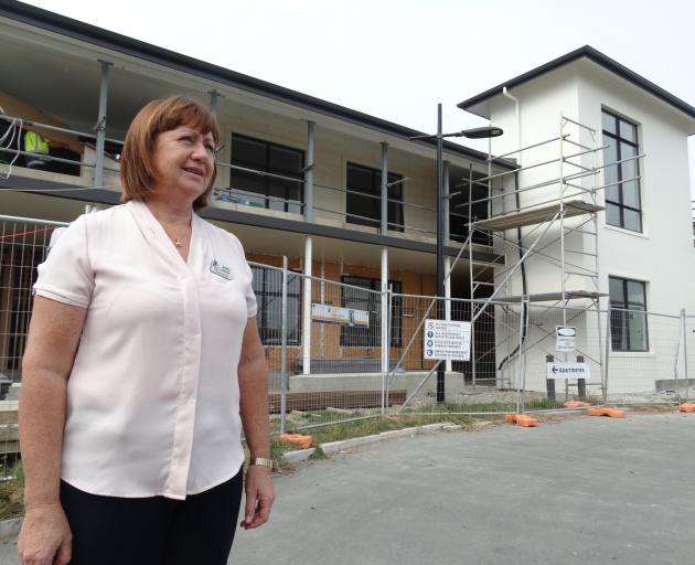 Observatory Village Lifecare general manager Rosie Dwyer stands outside its future two-storey, 10...