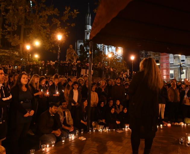 Hundred of people gather in Dunedin's Octagon this evening. Photo: Linda Robertson