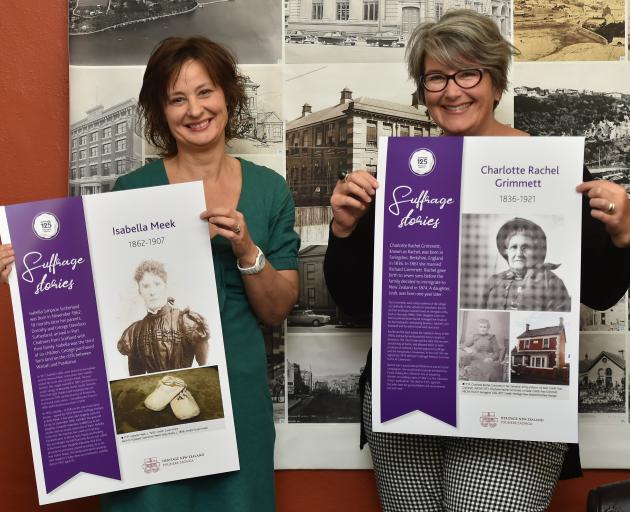 Heritage NZ assessment advisers Susan Irvine (left) and Sarah Gallagher show posters telling the lives of Otago-Southland signatories of the great Suffrage Petition of 1893, which will be on show at this weekend's Wanaka A&P Show. Photo: Gregor Richardson