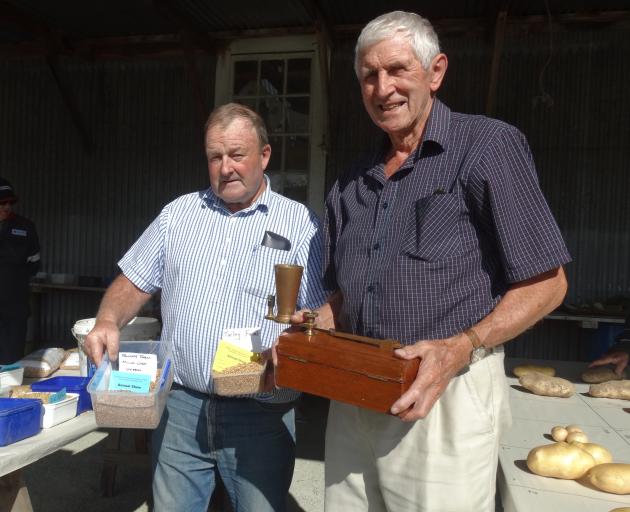 Lindsay Green (right), in the seeds shed with Temuka farmer Warren Stratford, at the recent Temuka and Geraldine A&P Show. Mr Green has been attending the show as a judge for more than 30 years. Photo: Chris Tobin