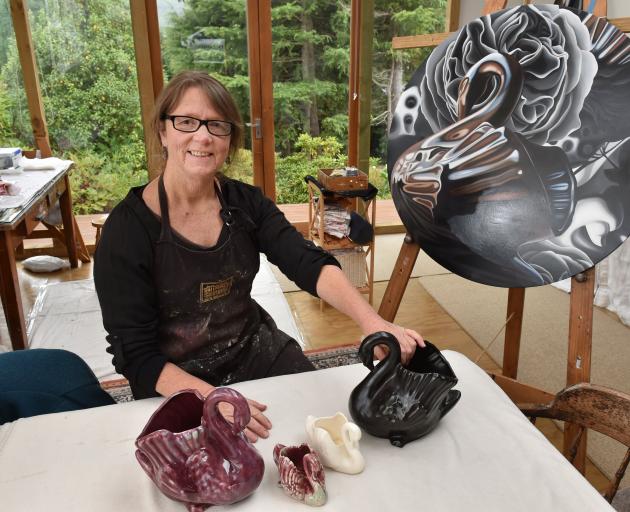 Rod Eales’ collection of Crown Lynn swans has inspired her art such as Shadows and Ghosts. Photo: Gregor Richardson