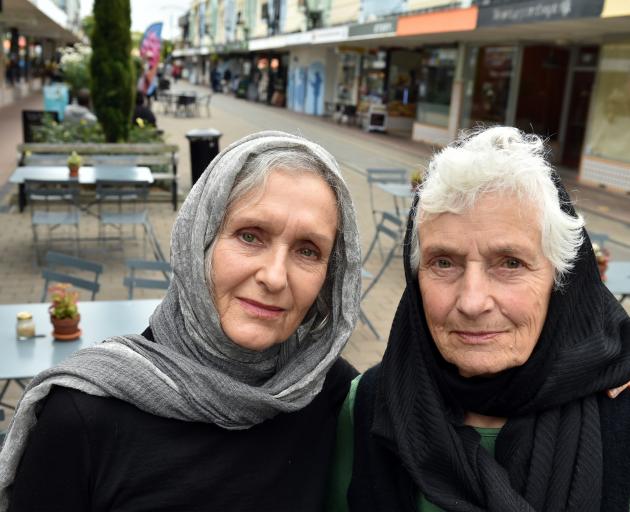 Alison Gilmore (left) and Caroline Maze wear headscarves in Christchurch yesterday afternoon, to show solidarity with the Muslim community after the Friday mosque shootings. Photos: Gregor Richardson