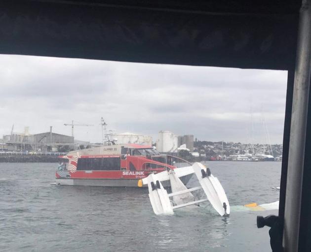 Sealink ferry is assisting after the seaplane flipped. Photo: Supplied via NZME