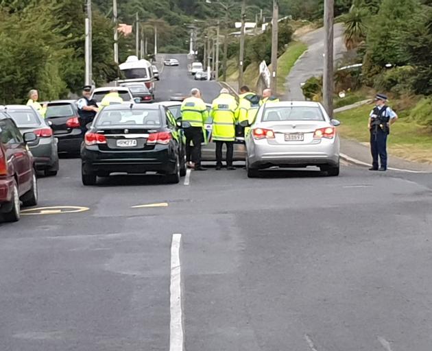 Police have flooded a Sommerville St. Photo: Tim Miller
