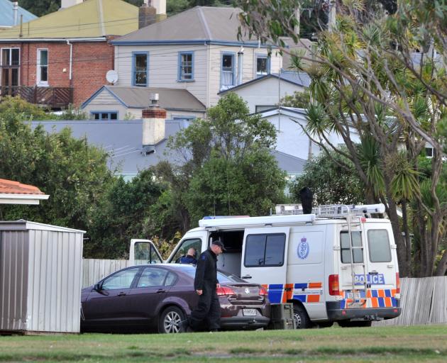 Police outside an  address in Somerville St Dunedin. Photo: Christine O'Connor