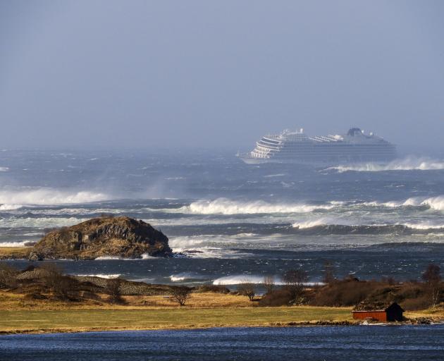 The cruise ship Viking Sky as it drifts after sending a Mayday signal because of engine failure in windy conditions near Hustadvika, off the west coast of Norway. Photo: Odd Roar Lange / NTB scanpix via AP