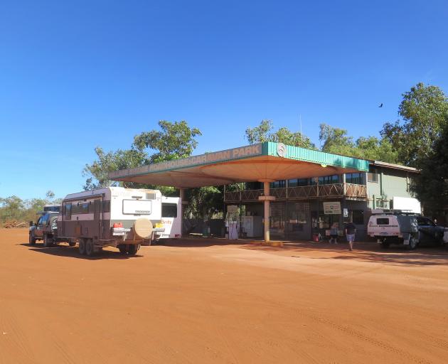 Rusty-red sandy soil fans across the forecourt of the Willare Roadhouse. Photos: Mike Yardley