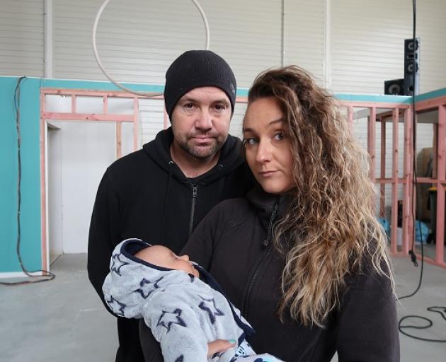 Gravity owners Mike and Sarah Jane Harford, with their 10-week-old boy Phoenix Fynn, closed shop last Friday. Photo: Supplied 