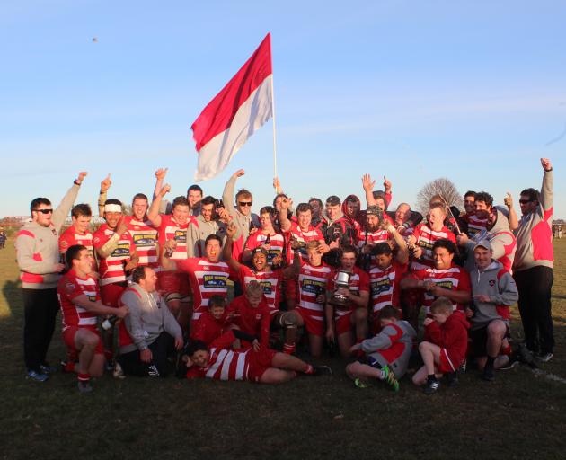 The Clutha Rugby team celebrates its 60-12 win against Crescent in the Southern Region final on...