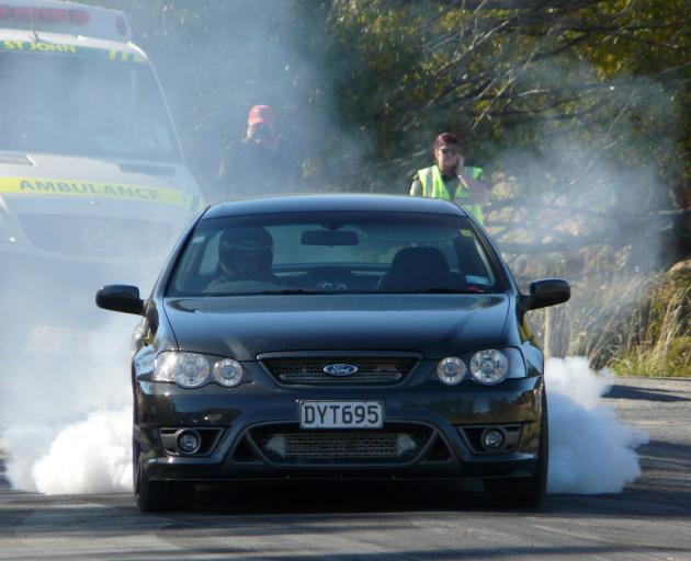 Quintin Smith, of Balclutha, smokes up at the 2019 Lawrence Quarter Mile Drags on Saturday. Photo...