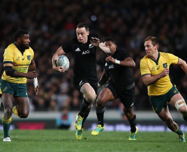Ben Smith runs the ball for the All Blacks against Australia. Photo: Getty Images