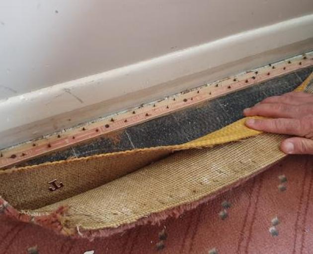 Ahmad Al Ghanem said the Dunedin house is cold and damp and their three-month-old son recently...