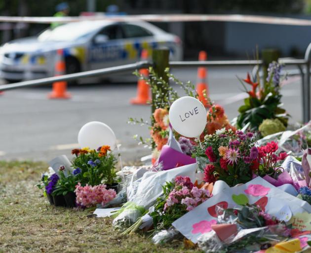 Flowers and condolences are seen in front of Al Noor mosque in Christchurch. Photo: Getty Images