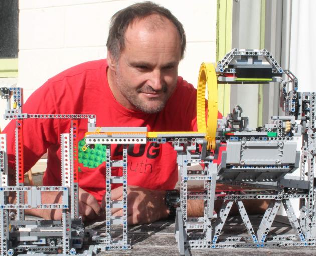 Chris Knight has been collecting Lego bricks since last year and has more than 10,000 in his...