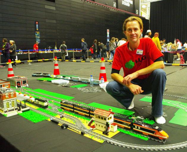  It started with one small Lego train set for Chris Dawson's yet-to-be-born child. That was five...