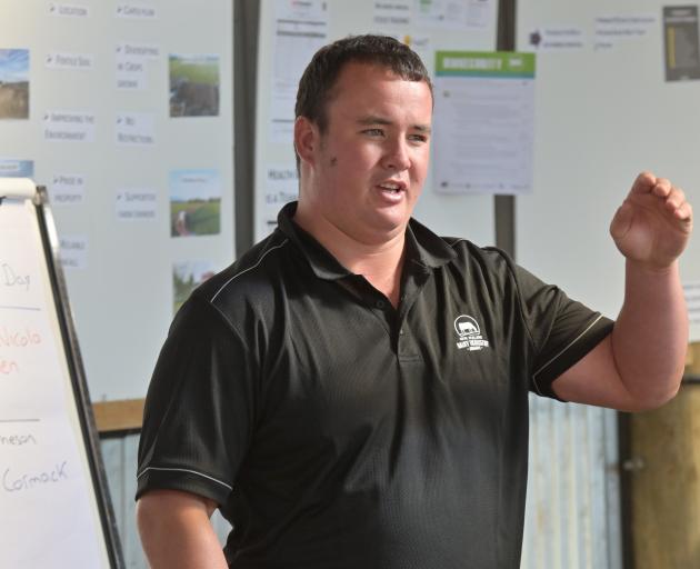 Otago Southland dairy farm manager of the year James Matheson speaks at the New Zealand Dairy Industry Awards Otago Southland field day at Bull Creek Rd, Outram last Wednesday. Photo: Linda Robertson