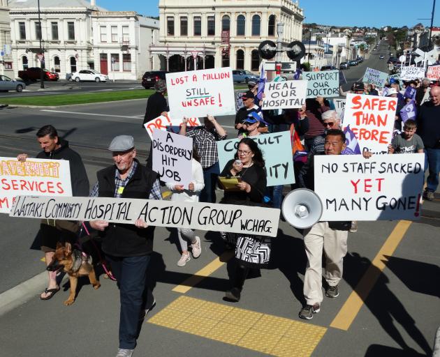 Members of the Waitaki Community Hospital Action group make their way along lower Thames St...