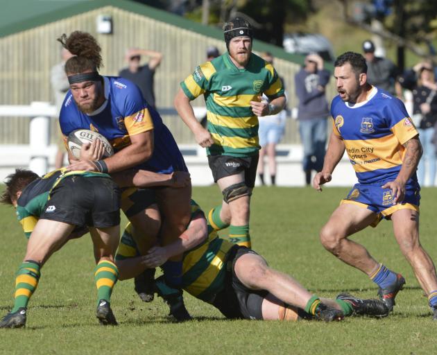Action from today's premier club rugby match between Green Island and Taieri at Miller Park....