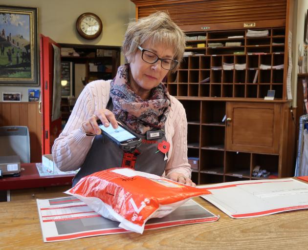  It was another busy morning for Arrowtown Post Office postal assistant Joan Sutton yesterday....