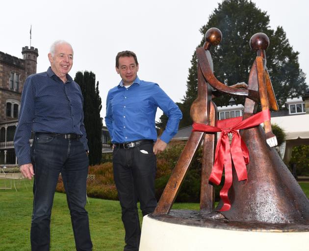 Sir Eion Edgar (left), organiser of the first Larnach Castle ball, and castle director Norcombe...