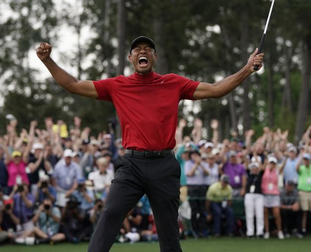 An ecstatic Tiger Woods celebrates his win at Augusta. Photo: AP