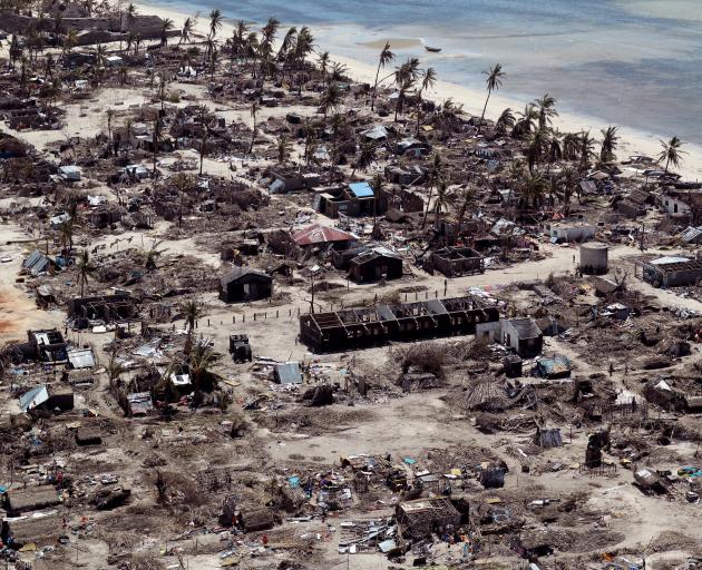 Buildings damaged during Cyclone Kenneth are seen from the air in a village north of Pemba,...