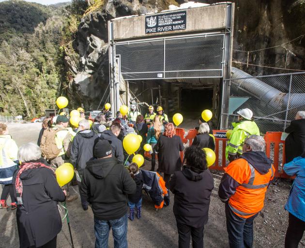 Balloons representing the 29 men who died in the Pike River mine explosion are released outside the pit entrance on Tuesday. Photo: Pike River Recovery Agency